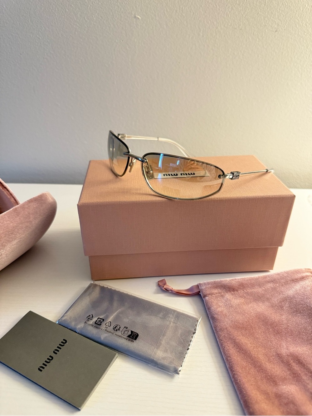 Miu Miu Silver Rimless Glasses with Soft Pink Case